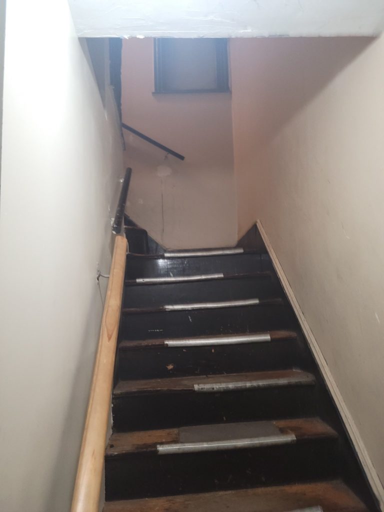 Picture of a common Boston apartment stairwell.
